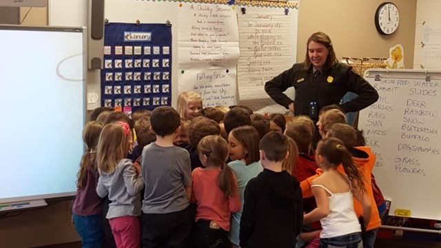 Park Ranger in a classroom with kids