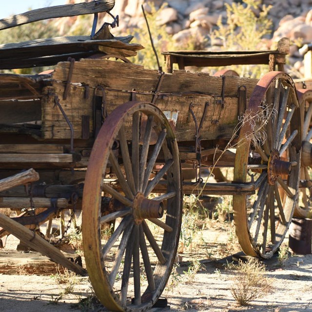 old wooden wagons with rusty metal-rimmed wheels