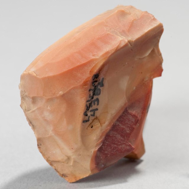 a peach colored microblade core