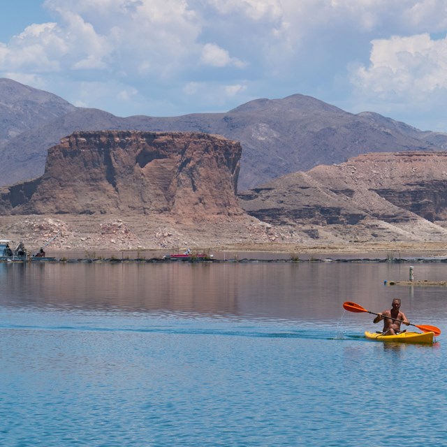 High desert feature rising from the water. 