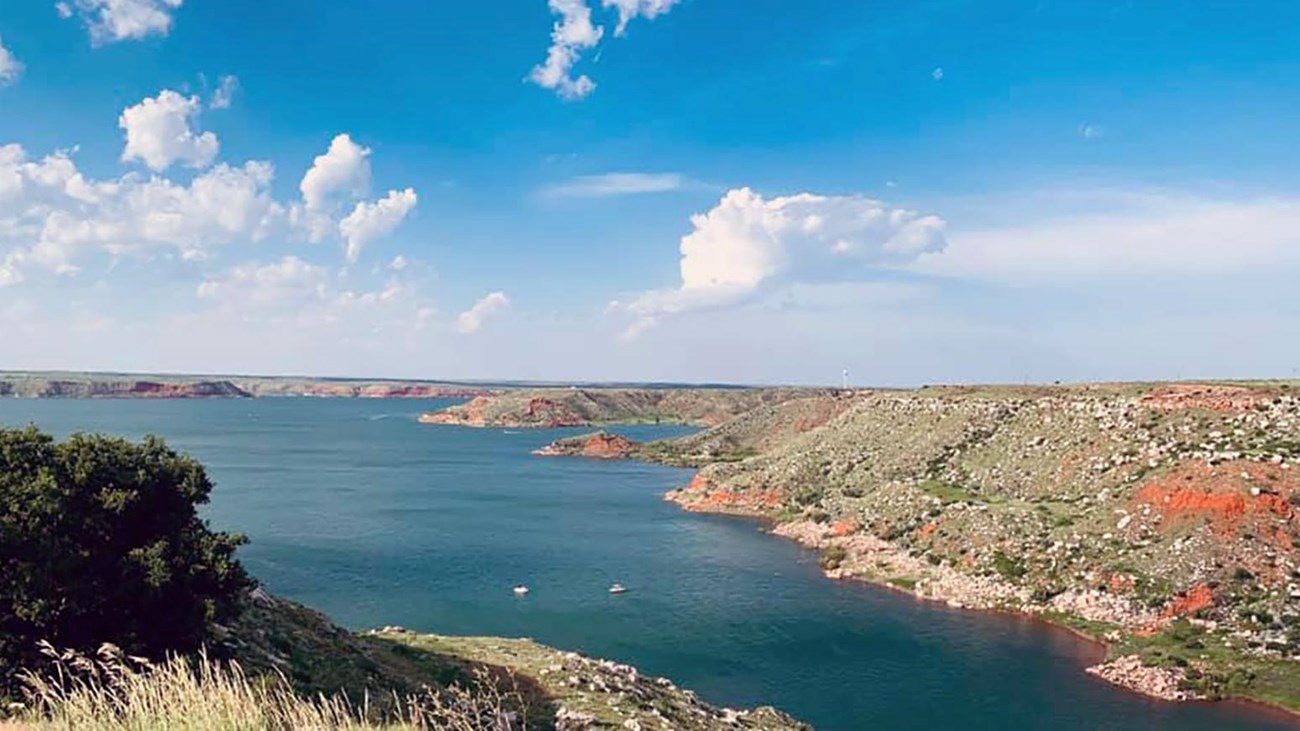 Boating at Lake Meredith in the bay at Fritch Fortress on a sunny day. 