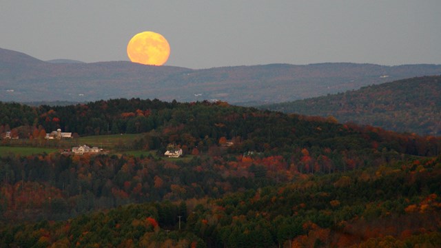 Full Moon rising above the hills of Woodstock VT