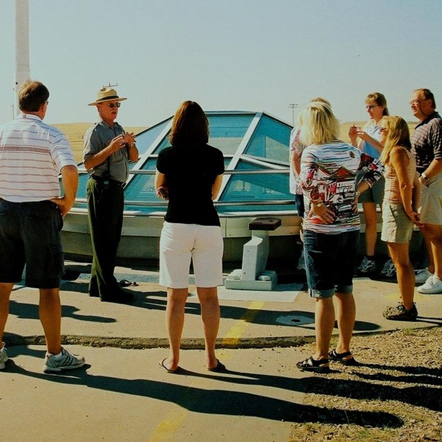 A park ranger leads a group program at the missile silo