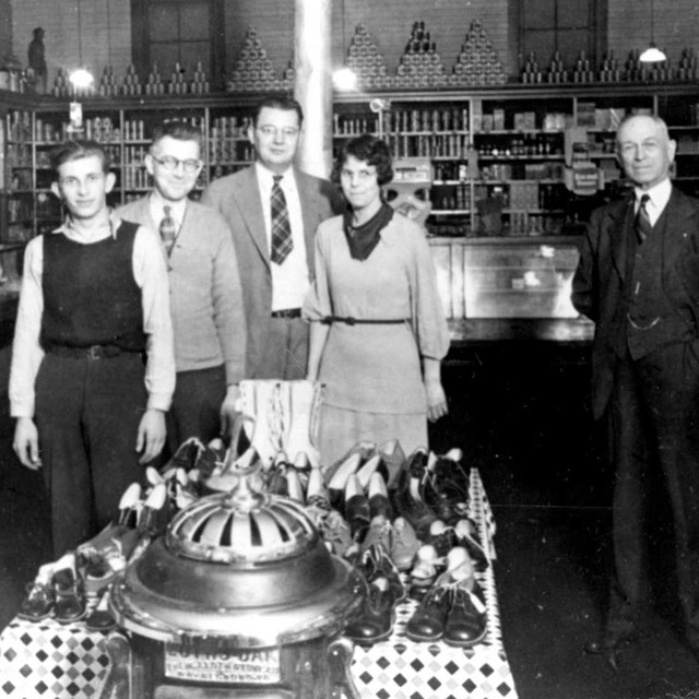 historic photo of people in a store