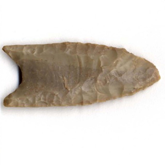 A grey stone arrowhead