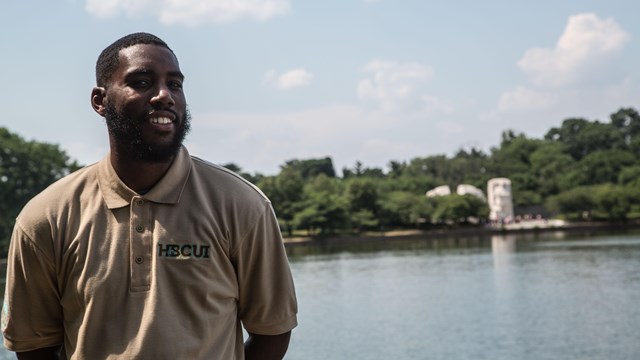 Portrait of an intern outside near a body of water