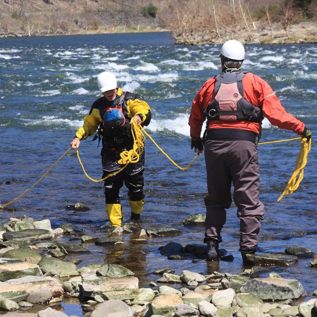 Staff conduct river training exercises on a large river.