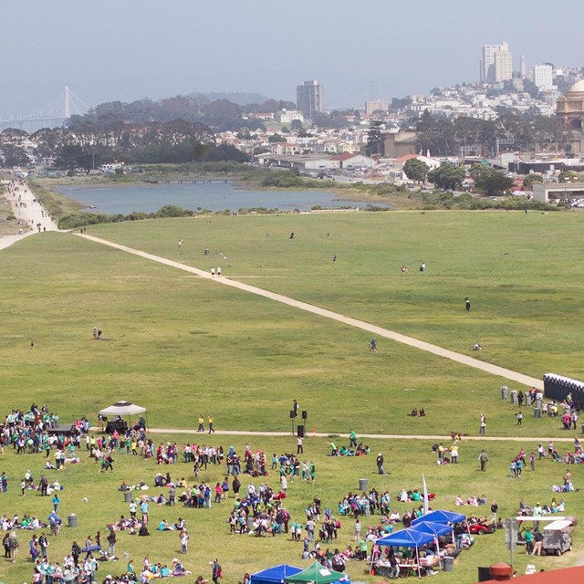 people stand on crissy airfield