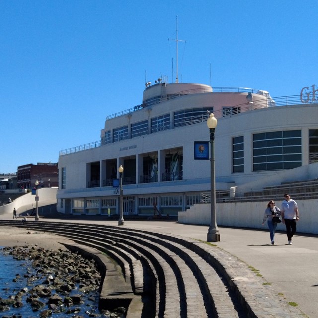 a white building designed to resemble the smooth curves and horizontal lines of an ocean liner.