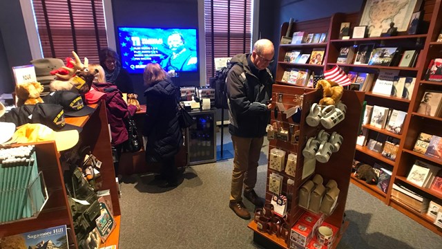 A sales floor with books and souvenirs.