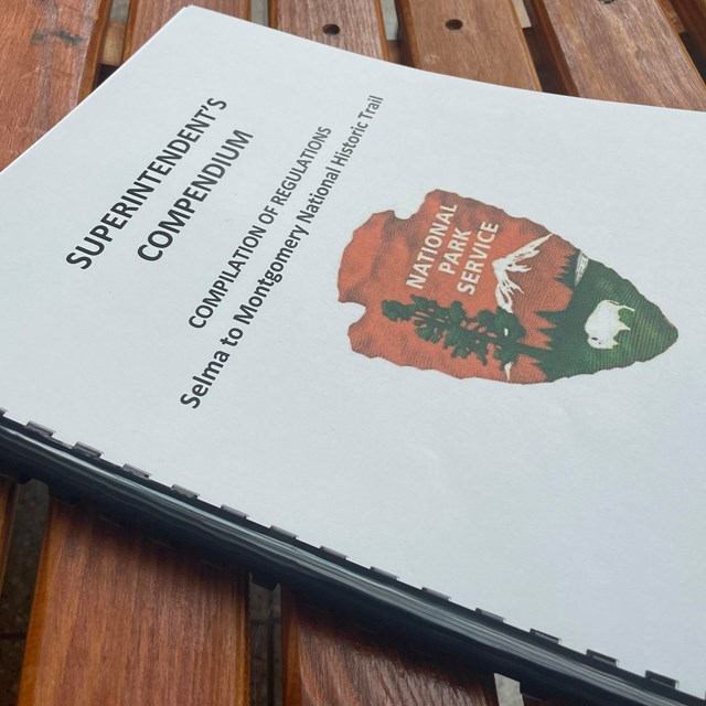 A spiral-bound booklet with title page reading 