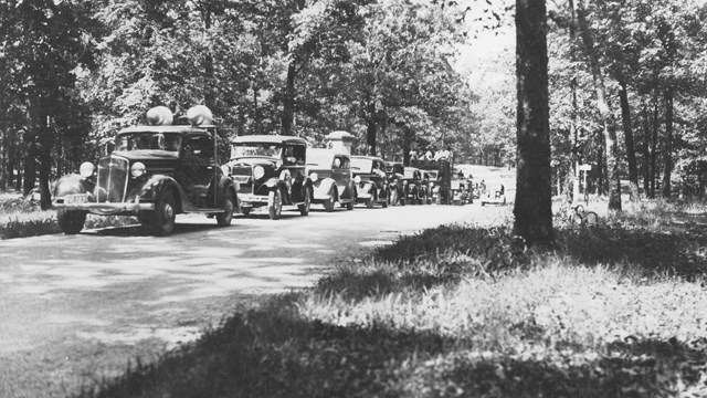 Historic image of a car caravan tour at Shiloh circa 1930. 