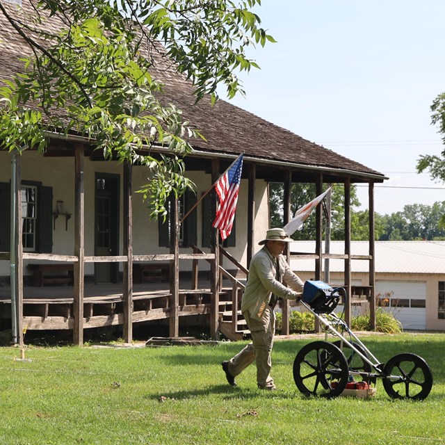 Archeologist pushes machine to create survey of the Bavauis-Amoureux yard.