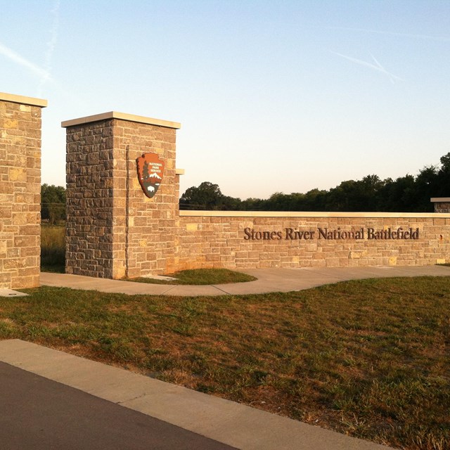 A stone gateway that says 