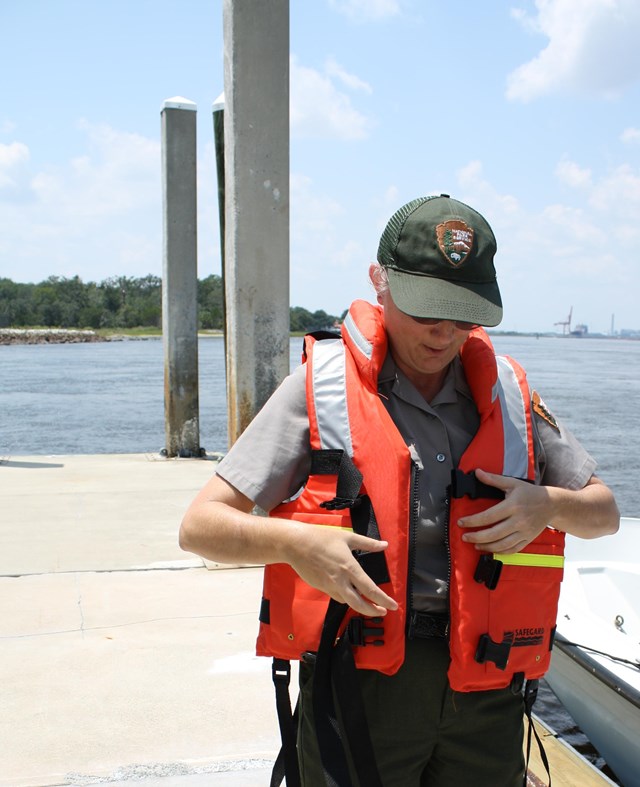 ranger in orange life jacket