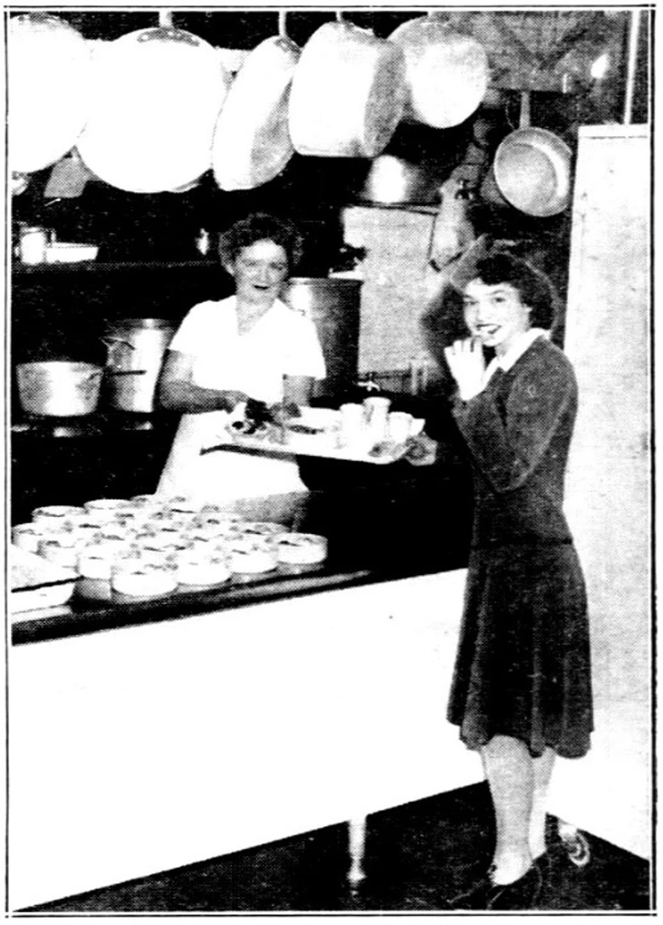 Graphic image of a white grocer wearing a red tie and white jacket pointing to a poster of a white woman with her right hand raised. She is pledging to pay no more than ceiling prices and to accept no rationed goods without giving up ration points.