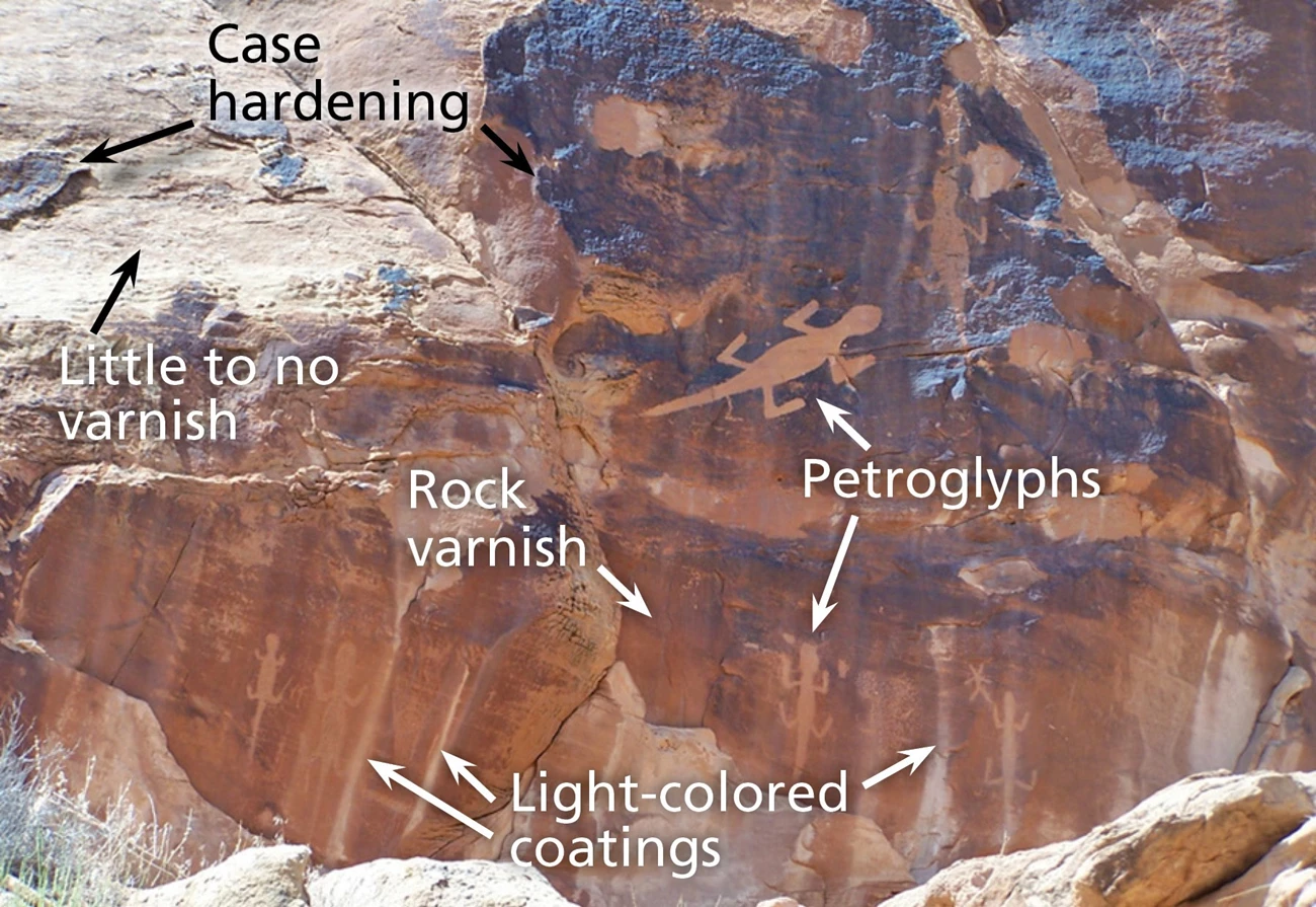Photo of rock wall with text.