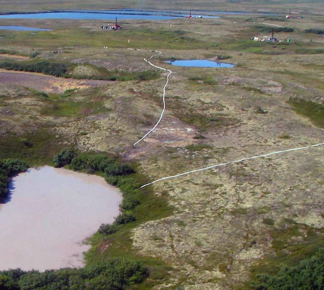 aerial view of ponds in a tree-less landscape