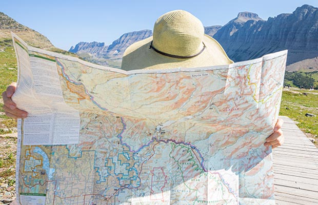 A person looks at a map A person looks at a map