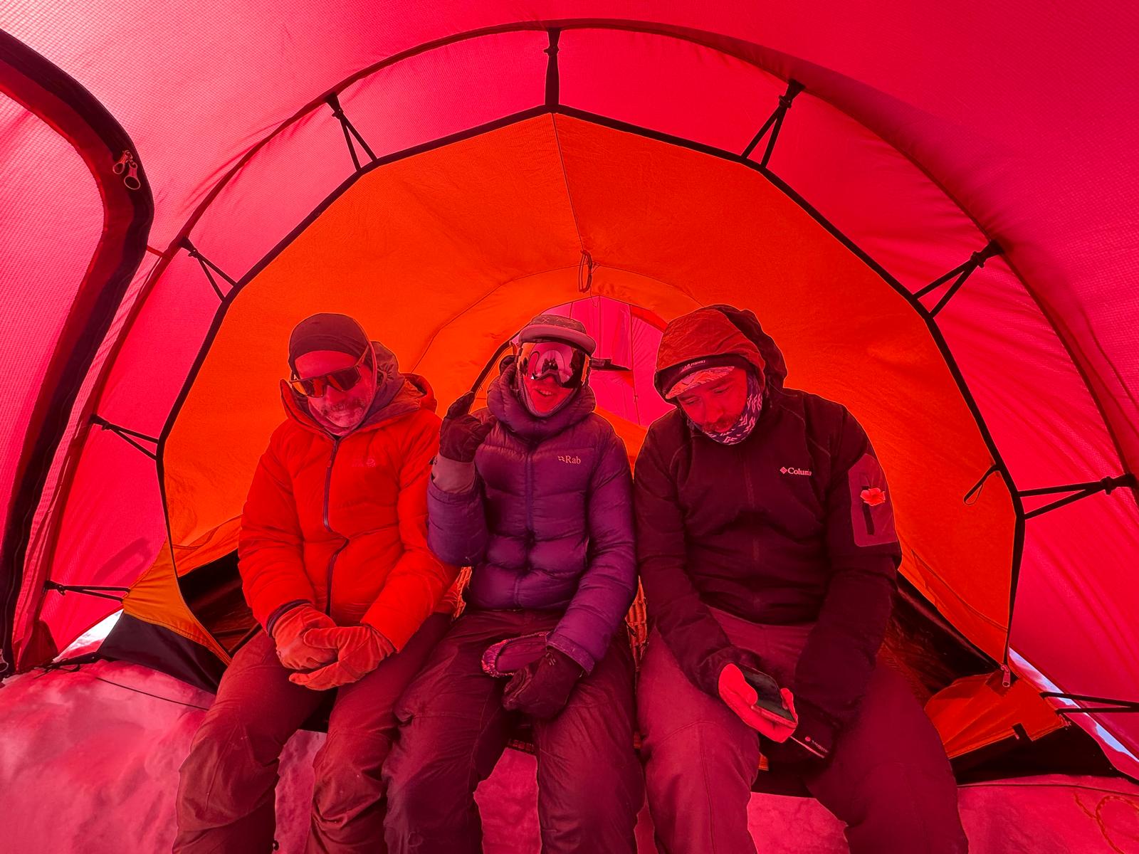 Patrol 2 Team Photo A 3 rangers sitting in a red tent in full winter gear