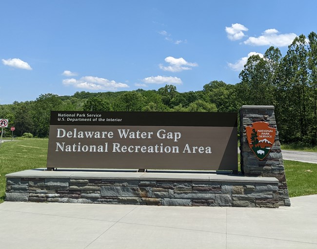 The Delaware Water Gap NRA entrance sign along Route 209 in the summer.