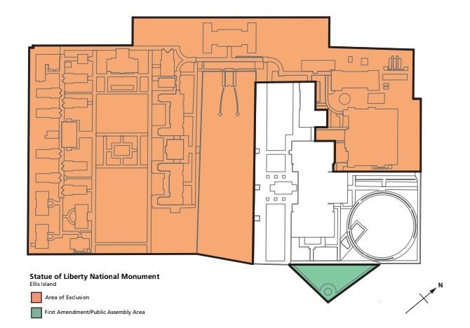 The flag pole area on Ellis Island is the designated area for public assembly.