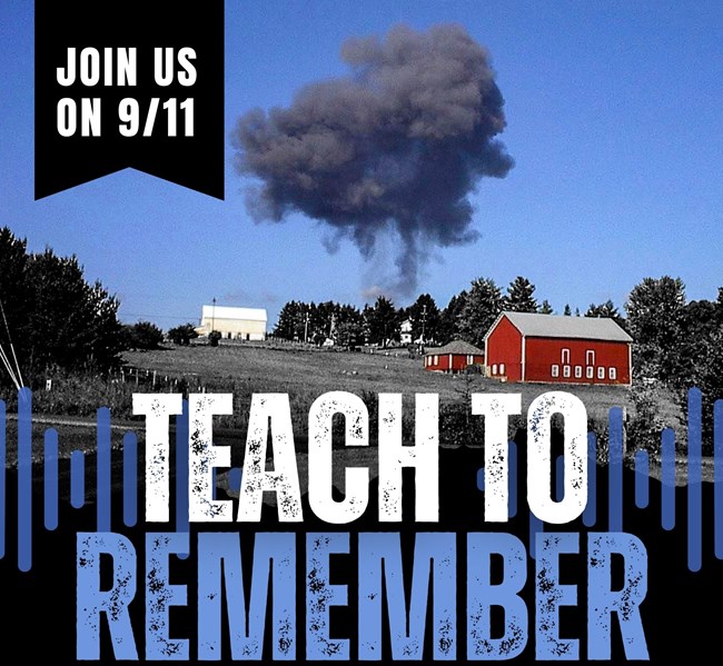 Plume of smoke from explosion in background of trees and a red barn.