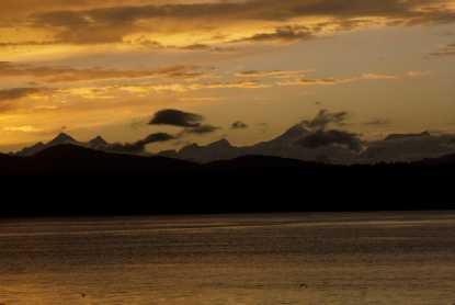 Water with mountains and clouds