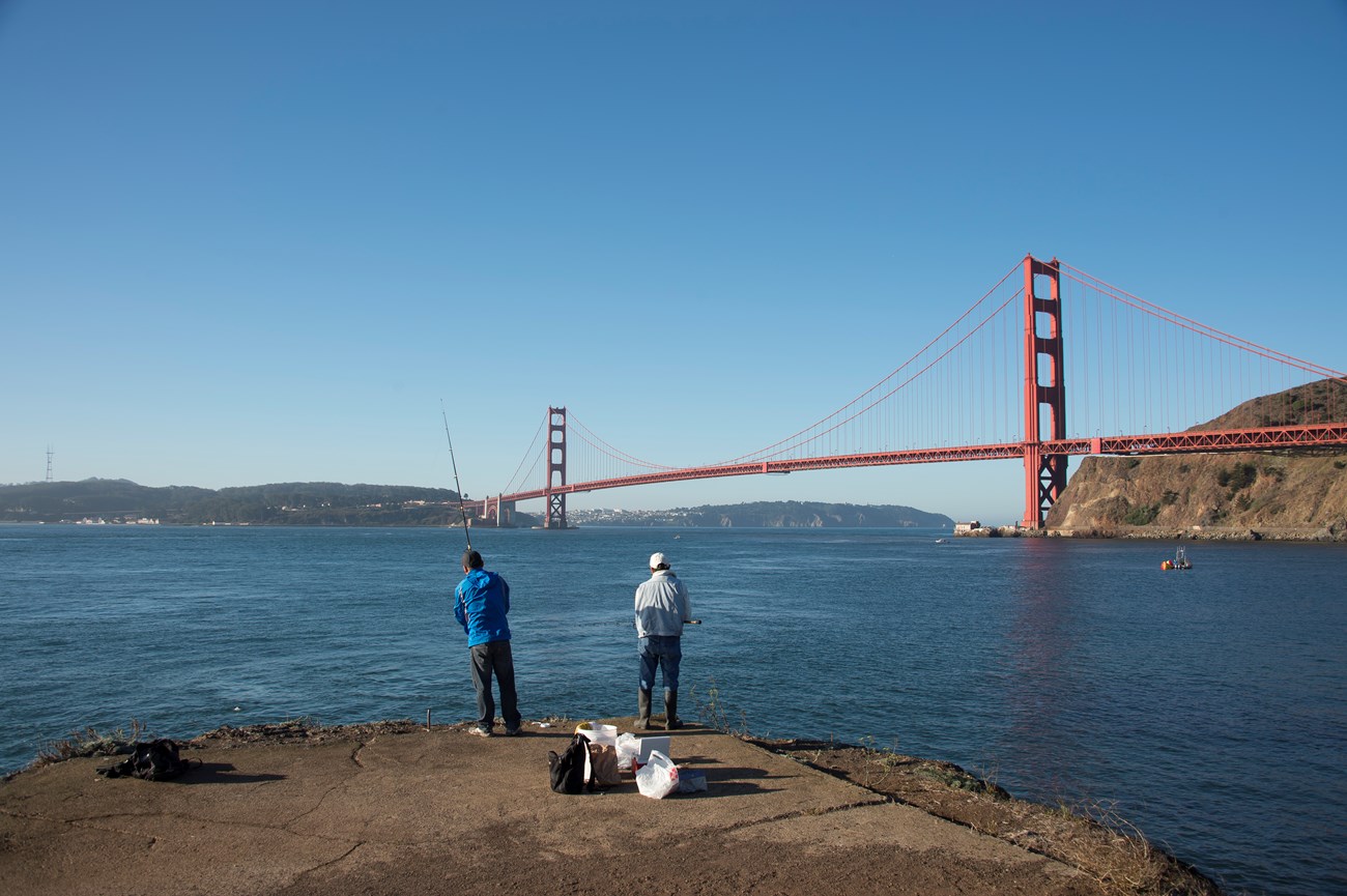 Two fisherman at fort baker