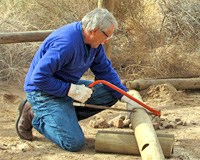 Richard Bryant constructing fence