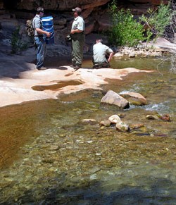 Crew members by one of the release sites.