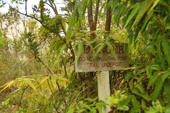 Trail undercut warning sign