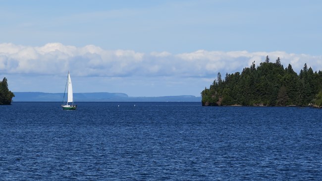 A lone sailboat at Anchor in Washington Harbor.