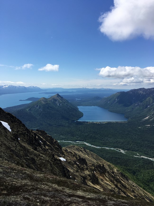 two lakes are seen from the top of a mountain