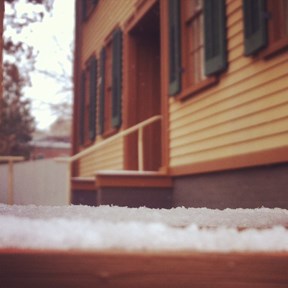 snow and ice on the sidewalk in front of Lincoln Home