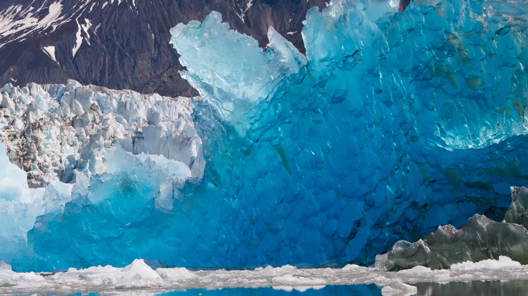 Blue Glacial Ice Blue Glacial Ice juts out in a jagged formation.