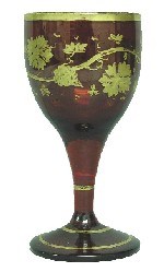 Gilt red wine glass.