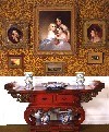 Buddhist altar table and paintings in Longfellow House dining room.