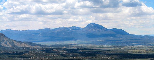 Looking across a landscape at a hilly, mountain feature.