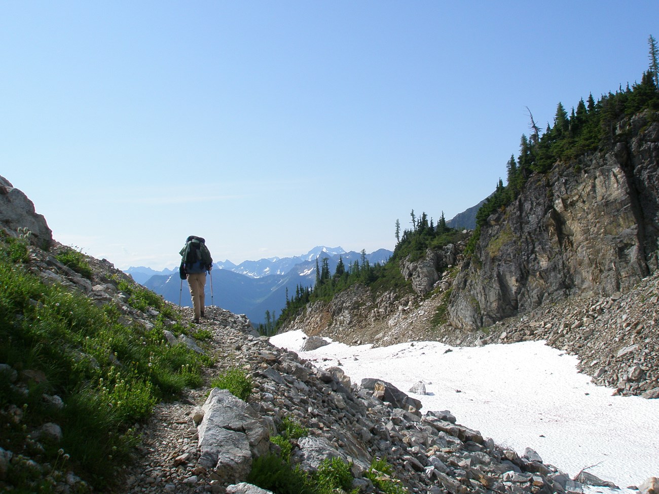 Hiker crossing Park Creek Pass