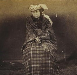 An old photo of Christina McDonald McKenzie Williams sitting in a chair, 1861.