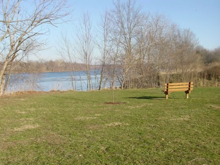 a bench on the shore of the Potomac