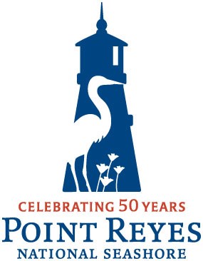 The silhouette of a heron and poppies overlaid on a cartoon of a blue lighthouse with a caption of Celebrating 50 Years: Point Reyes National Seashore.