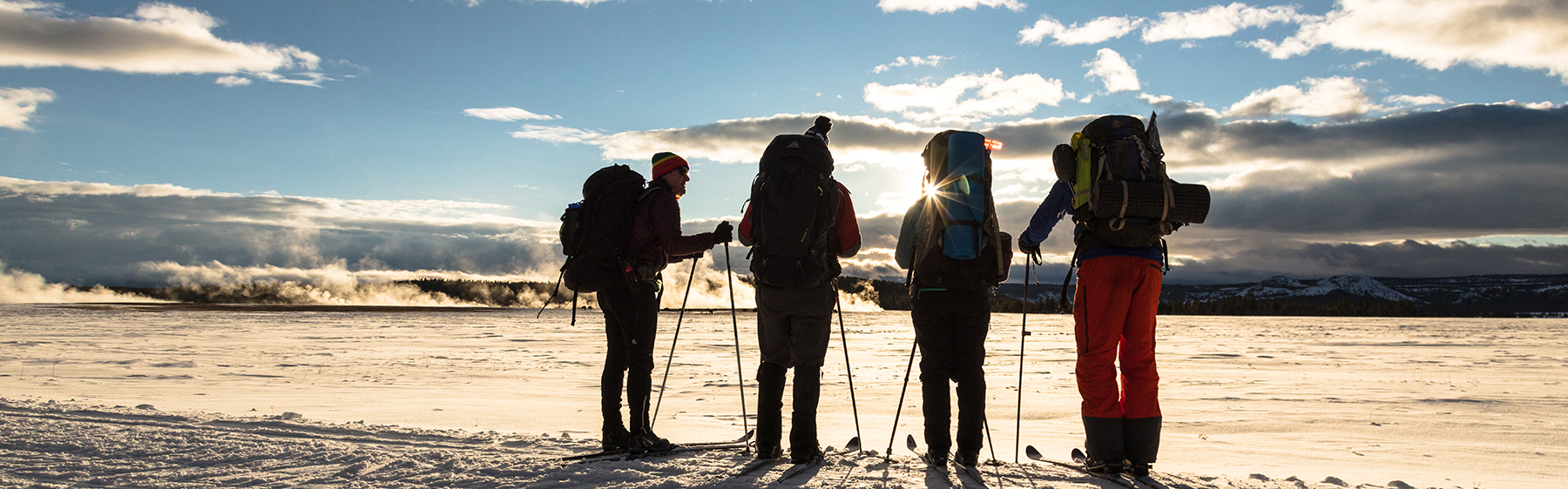 Backcountry campers watch the sunset