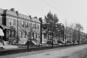 Rowhomes lining a street.