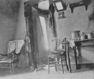 Two wooden chairs in an attic apartment.