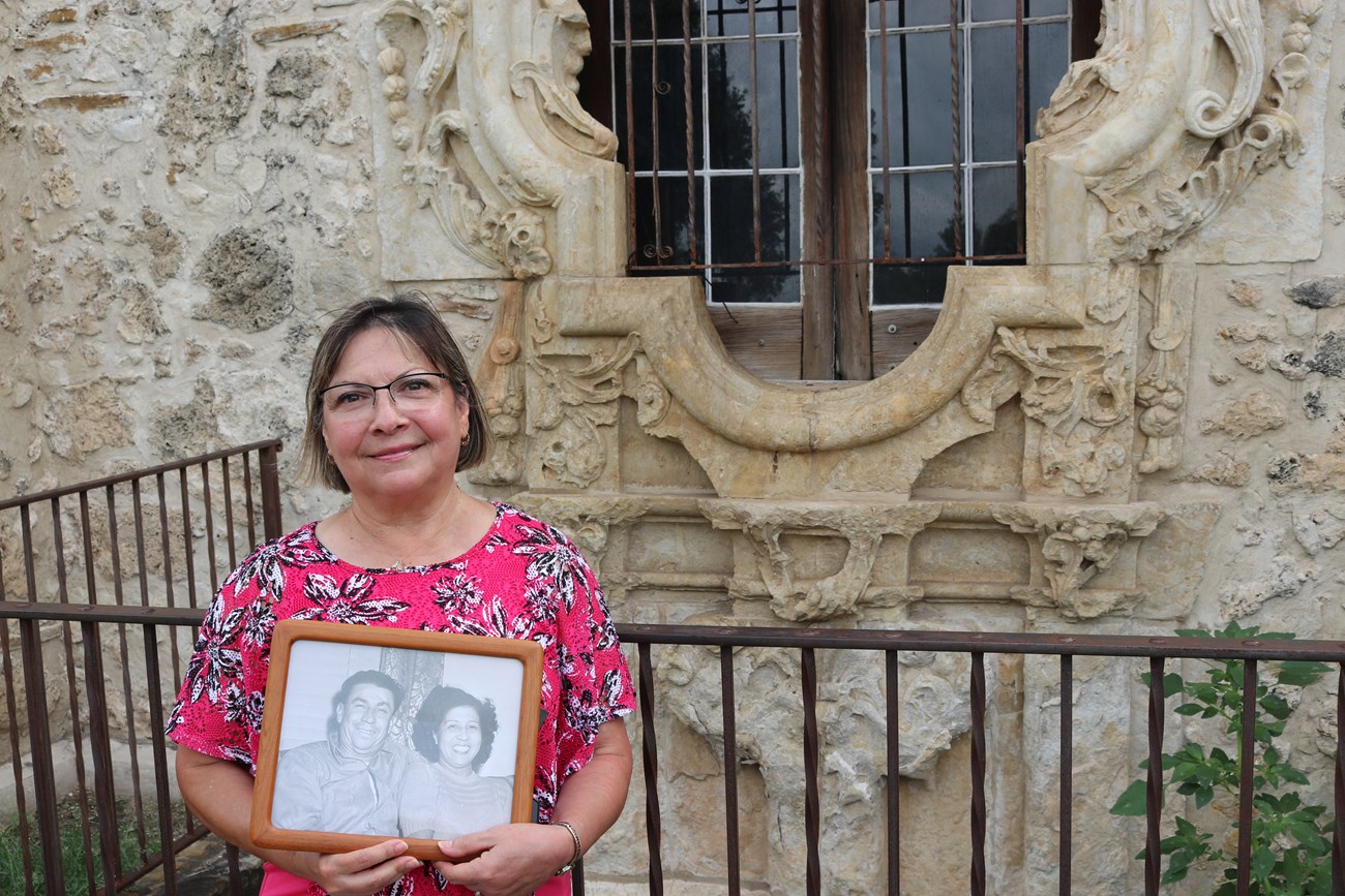 Lady in front of Rose Window