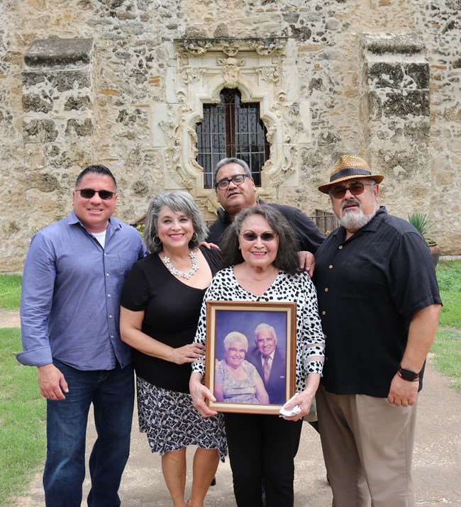 Family Photo in front of Rose Window