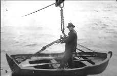 The Fort Ross yawl ready to launch from the highwire rig. P84-002.2n