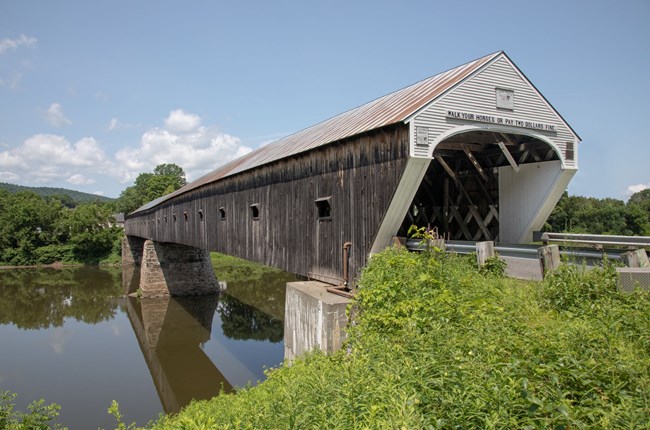 Covered bridge over river